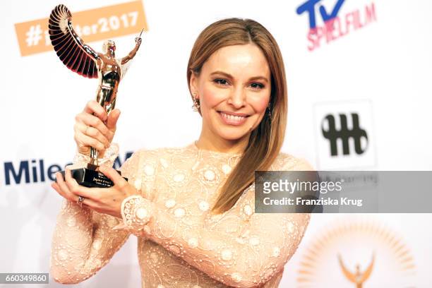 Mina Tander poses with her award at the Jupiter Award at Cafe Moskau on March 29, 2017 in Berlin, Germany.