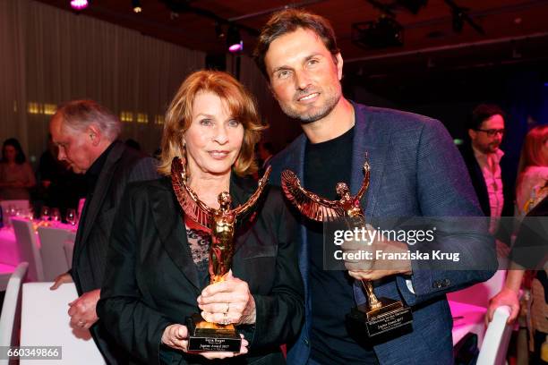 Senta Berger and her son Simon Verhoeven attend the Jupiter Award at Cafe Moskau on March 29, 2017 in Berlin, Germany.