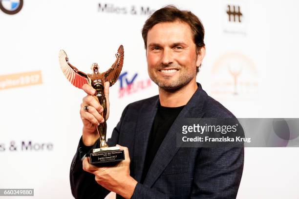 Simon Verhoeven poses with his award at the Jupiter Award at Cafe Moskau on March 29, 2017 in Berlin, Germany.