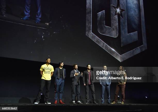 Actors Ray Fisher, Ezra Miller, director Zack Snyder, actors Henry Cavill, Ben Affleck and Jason Momoa speak onstage at CinemaCon 2017 Warner Bros....