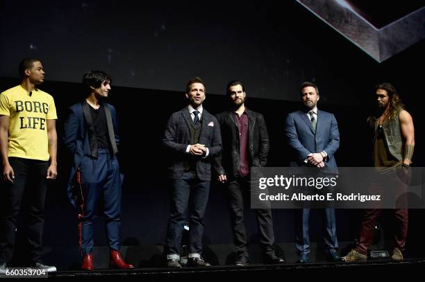 Actors Ray Fisher, Ezra Miller, director Zack Snyder, actors Henry Cavill, Ben Affleck and Jason Momoa speak onstage at CinemaCon 2017 Warner Bros....