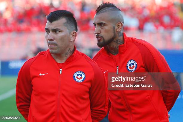 Arturo Vidal and Gary Medel of Chile look on prior a match between Chile and Venezuela as part of FIFA 2018 World Cup Qualifiers at Monumental...