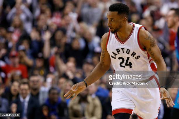 After knocking down a 3 pointer, Toronto Raptors guard Norman Powell on his way up court. Toronto Raptors vs Charlotte Hornets in 2ndhalf action of...