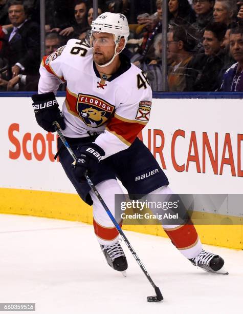 Jakub Kindl of the Florida Panthers carries the puck against the Toronto Maple Leafs during the first period at the Air Canada Centre on March 28,...