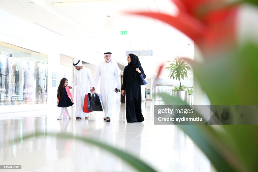Arabian family in shopping mall