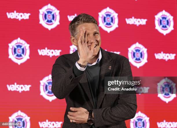 German football player Bastian Schweinsteiger greets audience as he is introduced at The PrivateBank Fire Pitch in Chicago, Illinois, USA, 29 March...