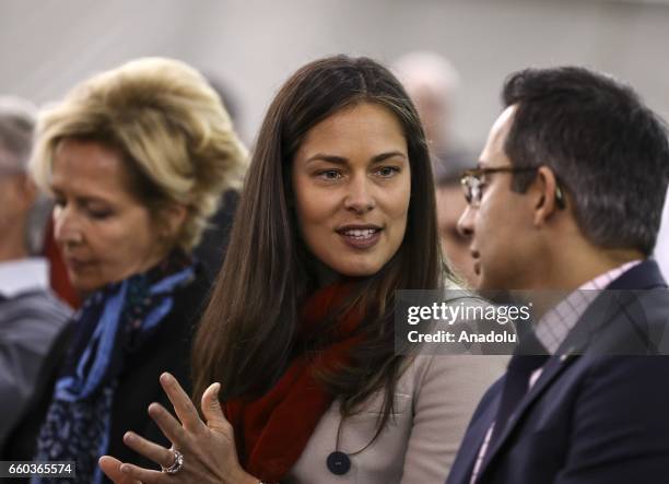 The wife of German football player Bastian Schweinsteiger, Ana Ivanovic reacts as Schweinsteiger is introduced at The PrivateBank Fire Pitch in...