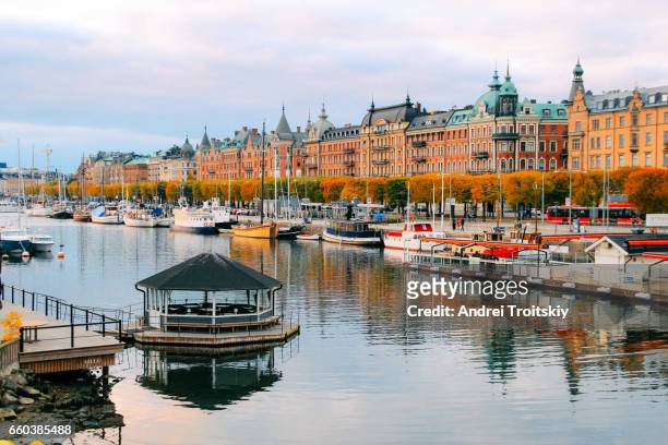 autumn evening as seen from the bridge to djurgarden, stockholm, sweden - stockholm stock pictures, royalty-free photos & images