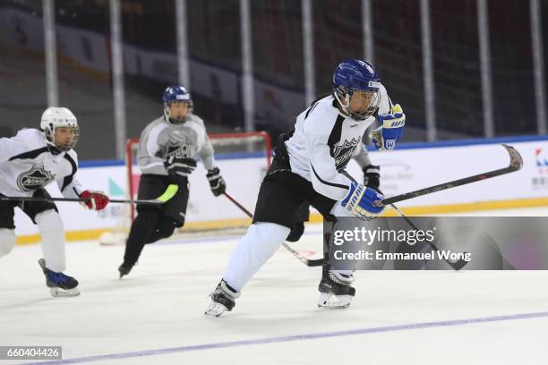 Young Chinese hockey players participate learn to play Youth Hockey Clinic during the NHL announcement in China at LeSports Center on March 30, 2017...