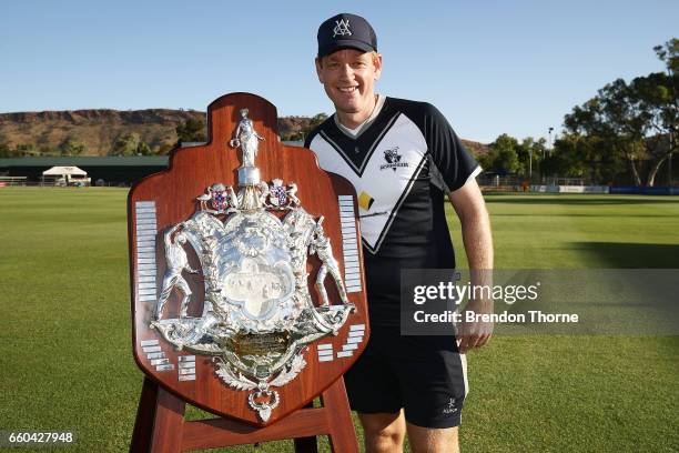 Bushrangers coach, Andrew McDonald poses with the Sheffield Shield following the Sheffield Shield final between Victoria and South Australia on March...