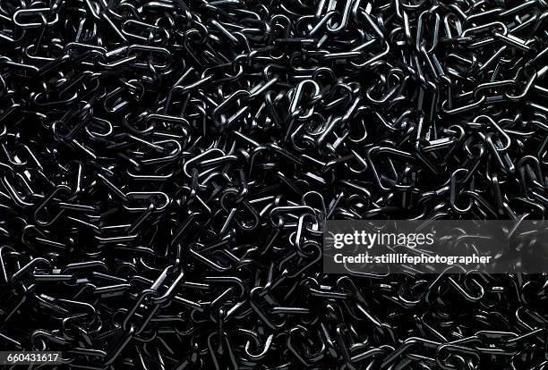 black chain in full frame - chain stock pictures, royalty-free photos & images