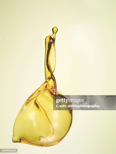 oil liquid rising up - oil splashing stock pictures, royalty-free photos & images