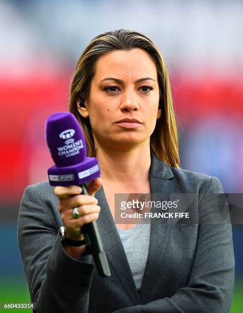 French journalist Anne-Laure Bonnet looks on prior to the UEFA Women's Champions League quarter-final second leg football match between Paris...