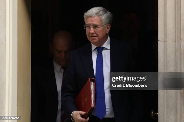 Michael Fallon, U.K. Defence secretary, leaves number 10 Downing Street in London, U.K., on Thursday, March 30, 2017. U.K. Prime Minister Theresa...