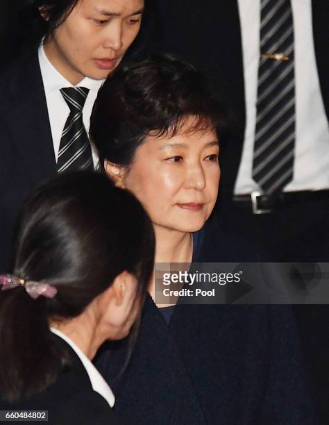 Ousted South Korean President Park Geun-hye, leaves after hearing on a prosecutors' request for her arrest for corruption at the Seoul Central...