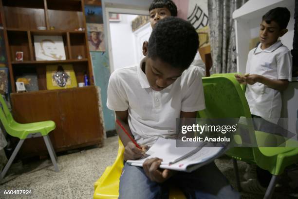 An Iraqi boy studies his lessons in orphanage named "Safe House for Orphans" in Baghdad, Iraq on March 26, 2017. An Iraqi benevolent Hesham...