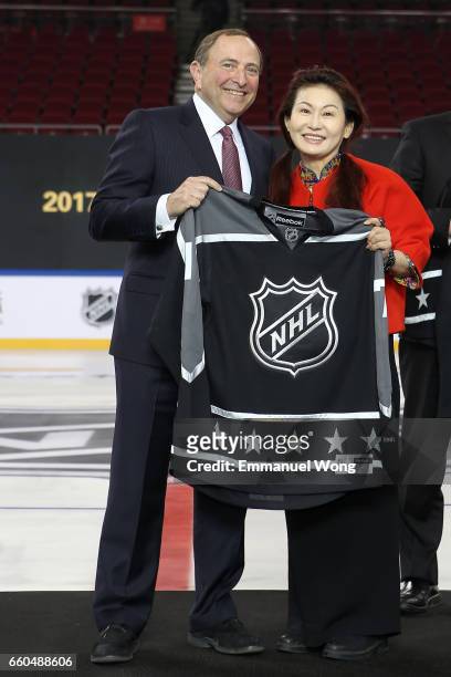 Commissioner Gary Bettman and Bloomage Chairman & Executive Director Madame Zhao Yan attend the NHL Announcement in China at LeSports Center on March...