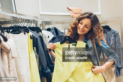 Girls Trying On Clothes Mall Stock Photos and Pictures - 6,718 Images