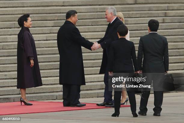 Chinese President Xi Jinping shakes hands with Serbian President Tomislav Nikolic before during a welcoming ceremony outside the Great Hall of the...