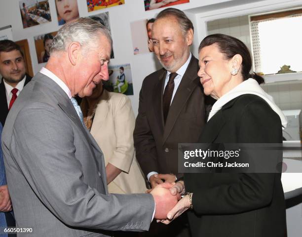 Prince Charles, Prince of Wales is greeted by Princess Marina Sturdza as he visits the FARA Foundation in Popesti Leordeni and meets young people and...