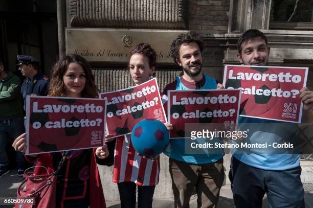 Members of the Left Italian party protest in front the Ministry of Labour against the Minister Giuliano Poletti on March 29, 2017 in Rome, Italy....