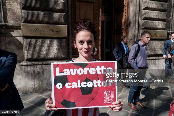 Members of the Left Italian party protest in front the Ministry of Labour against the Minister Giuliano Poletti on March 29, 2017 in Rome, Italy....