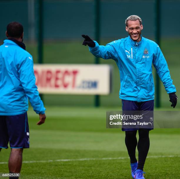 Yoan Gouffran points and laughs with Vurnon Anita during the Newcastle United Training Session at The Newcastle United Training Centre on March 30,...