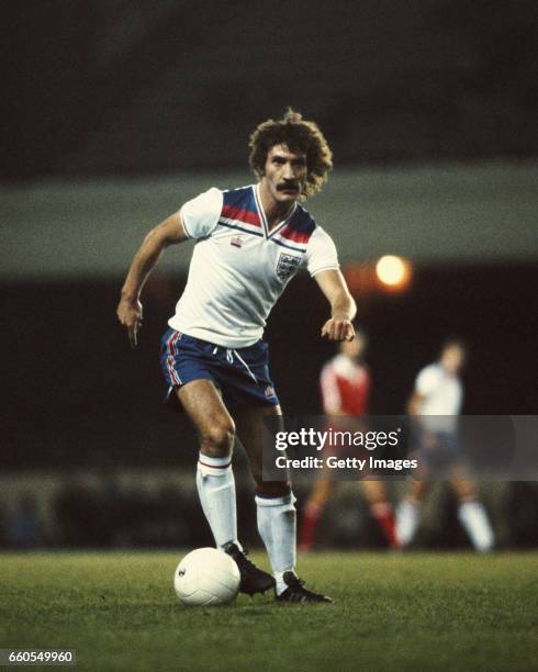 England player Terry McDermott in action during a match circa 1982.