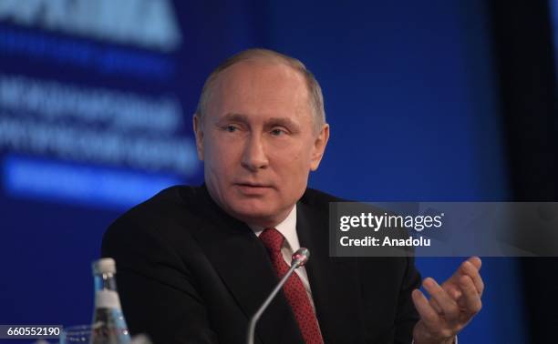 Russia's President Vladimir Putin addresses a plenary session titled "People and the Arctic" as part of the 2017 Arctic: Territory of Dialogue...