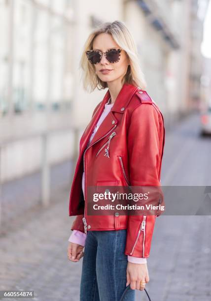 Lisa Hahnbueck wearing Coach ICON Moto Leather Jacket, Jbrand Carola High Waist Jeans, Urban Outfitters Cropped Sweatshirt, Louis Vuitton Pokerface...