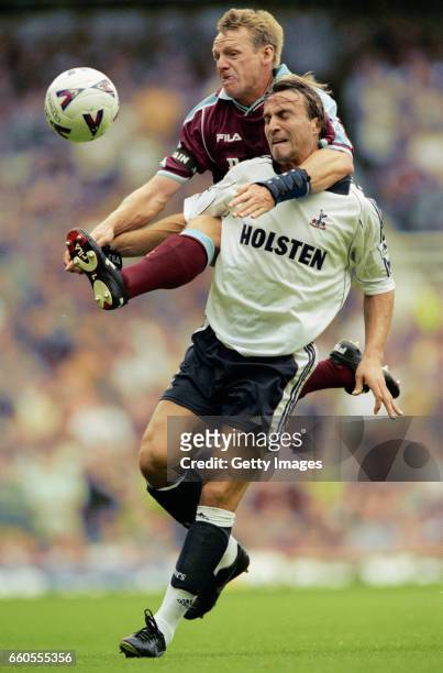 West Ham full back Stuart Pearce challenges David Ginola of Spurs during an FA Premiership match at Upton Park on August 7, 1999 in London, England.