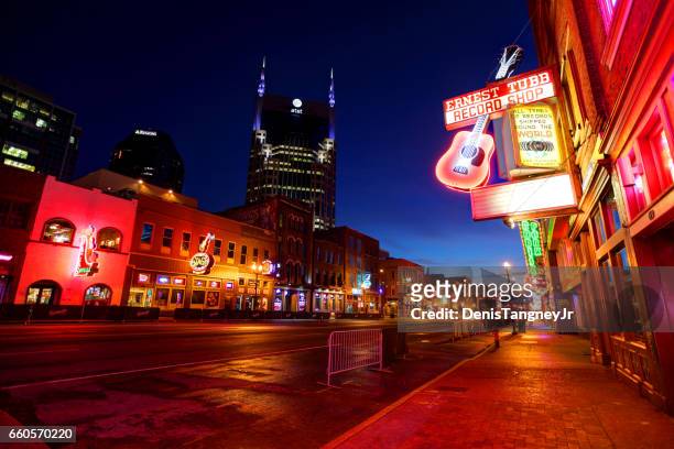 broadway in downtown nashville, tennessee - nashville downtown district stock pictures, royalty-free photos & images