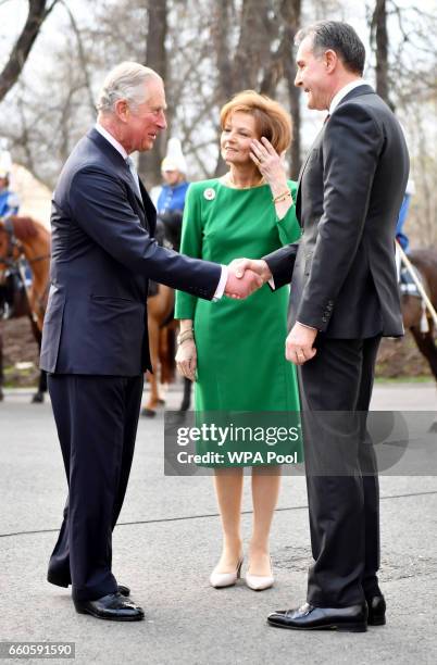 Prince Charles, Prince of Wales greets Crown Princess Margareta of Bucharest and Prince Radu of Bucharest during a Tea with the Romanian Royal Family...