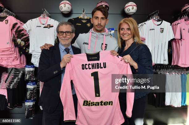 Citta' di Palermo player Edoardo Goldaniga poses with Filippo Mule' and Elvira Terranova of Occhi Blu Onlus as he visits Club Store at Renzo Barbera...