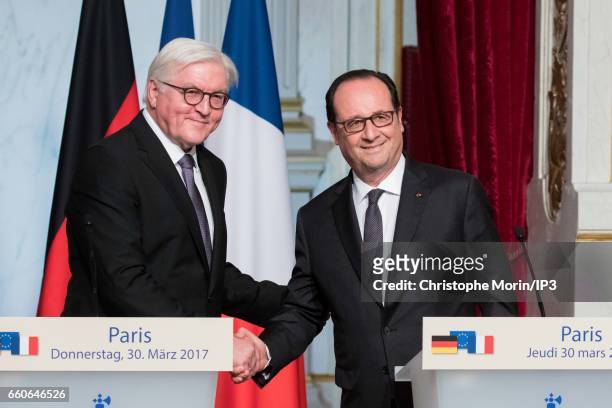 French President Francois Hollande and President of the Federal Republic of Germany Frank Walter Steinmeier hold a press conference after their lunch...