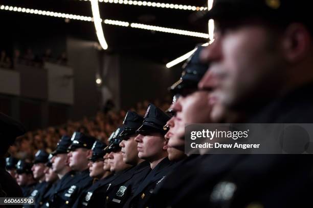 The newest members of the New York City Police Department listen to remarks from New York City Mayor Bill De Blasio during their police academy...