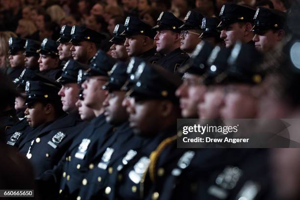 The newest members of the New York City Police Department listen to remarks from New York City Police Commissioner James O'Neill during their police...