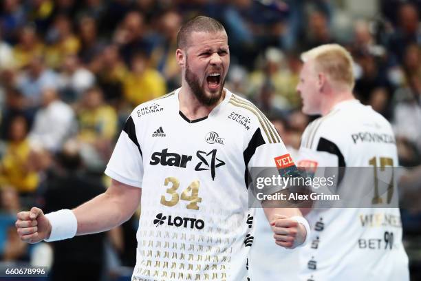 Ilija Brozovic of Kiel celebrates during the EHF Champions League Quarter Final Leg 2 match between Rhein Neckar Loewen and THW Kiel at SAP Arena on...