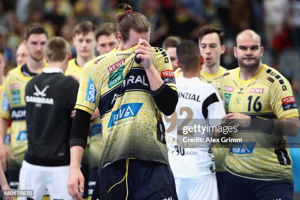 Kim Ekdahl du Rietz and team mates of Rhein-Neckar Loewen react after the EHF Champions League Quarter Final Leg 2 match between Rhein Neckar Loewen...