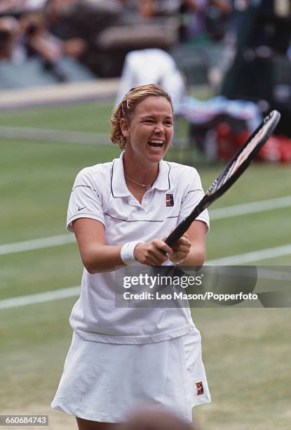 American tennis player Lindsay Davenport pictured in surprise and celebration after winning the final of the Women's Singles tournament against...