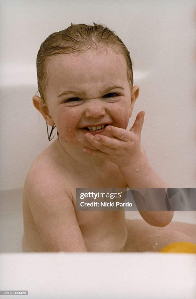 Baby Girl Laughing in Bathtub