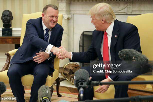 President Donald Trump and Prime Minister Of Denmark Lars Lokke Rasmussen shake hands for the press in the Oval Office at the White House March 30,...