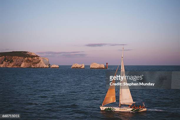 The racing yacht Heineken sails past the Needles to enter Southampton during the Whitbread round the World yacht race on 1 June 1994 off Cowes on the...
