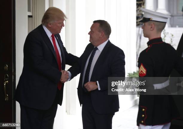 President Donald Trump greets Prime Minister Lokke Rasmussen of Denmark outside the West Wing of the White House March 30, 2017 in Washington, DC....