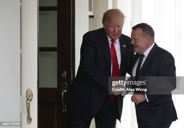 President Donald Trump greets Prime Minister Lokke Rasmussen of Denmark outside the West Wing of the White House March 30, 2017 in Washington, DC....