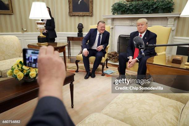 President Donald Trump poses for photographs with Prime Minister Of Denmark Lars Lokke Rasmussen in the Oval Office at the White House March 30, 2017...