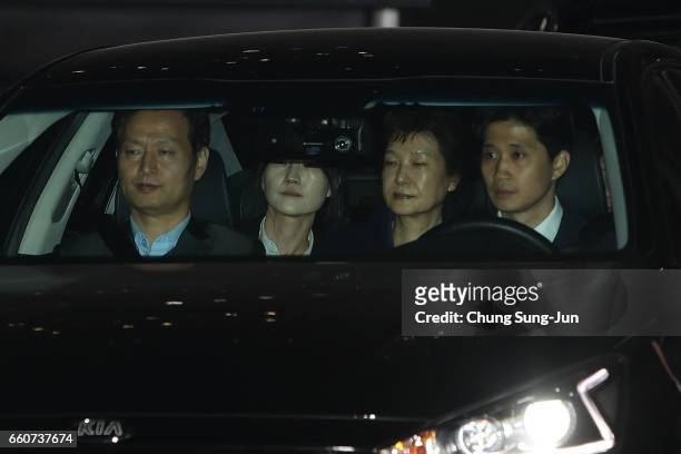 Ousted South Korean President Park Geun-hye , leaves the prosecutors' office as she is transferred to a detention house on March 31, 2017 in Seoul,...