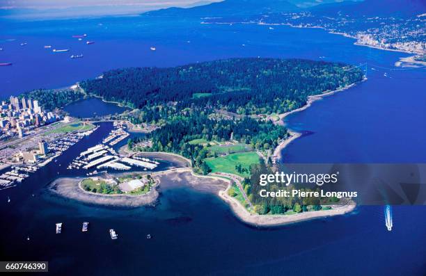 aerial view of stanley park, in vancouver, british columbia, canada - stanley park vancouver canada stock pictures, royalty-free photos & images