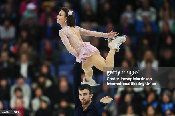 Meagan Duhamel and Eric Radford of Canada compete in the Pairs Free Skating during day two of the World Figure Skating Championships at Hartwall...