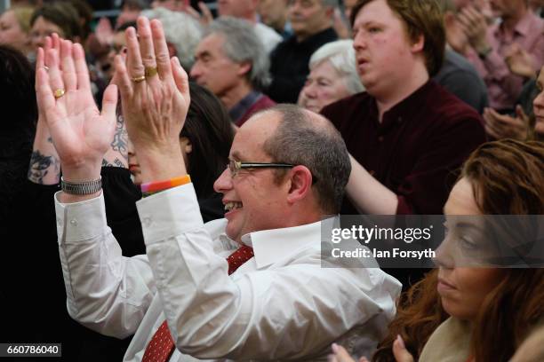 Supporters applaud as Labour leader Jeremy Corbyn addresses party supporters at the River Tees Watersports Centre during a visit to rally local...